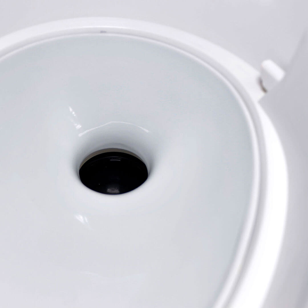 The installed insert with the blade opening visible.